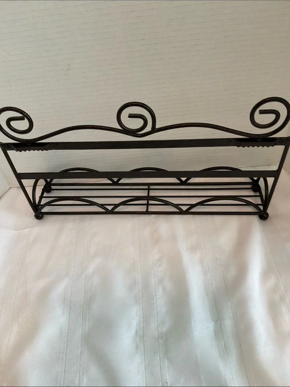 Decorative Brown Metal Wall Rack with Scroll Design